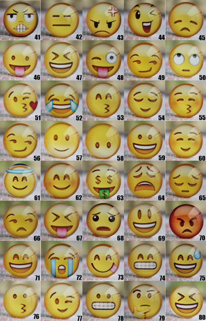 May include: Eighty yellow glass cabochons with different emoji faces. Each cabochon is approximately 1 inch in diameter.