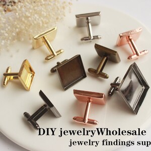 May include: Assortment of eight square-shaped cufflinks in various colors, including gold, silver, rose gold, and brown. The cufflinks are made of metal and have a smooth finish. DIY jewelry wholesale jewelry findings supplies.