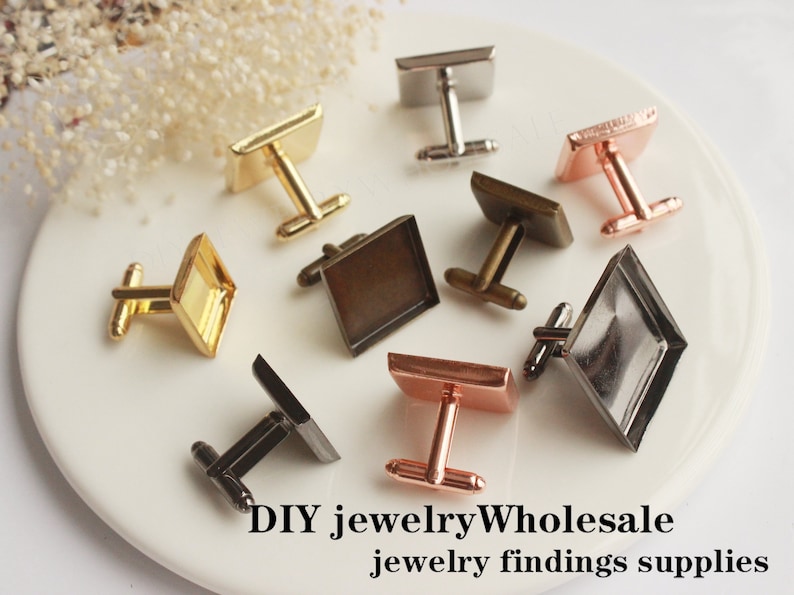 May include: Assortment of eight square-shaped cufflinks in various colors, including gold, silver, rose gold, and brown. The cufflinks are made of metal and have a smooth finish. DIY jewelry wholesale jewelry findings supplies.