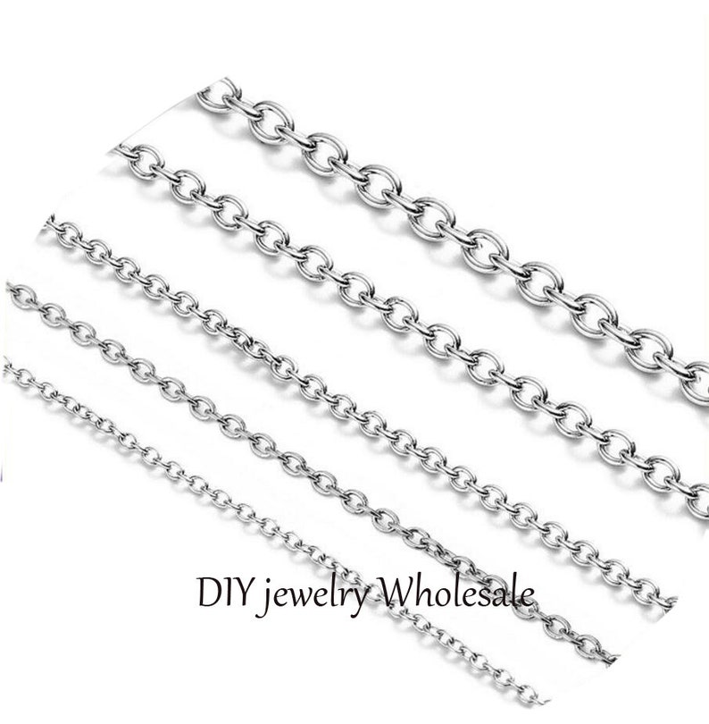 May include: Four silver chain necklaces of varying lengths and thicknesses.  DIY jewellery wholesale.