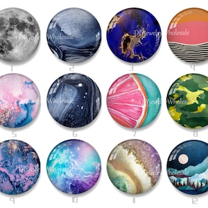 May include: Twelve round, colourful, glass cabochons with various designs, including a moon, galaxy, abstract patterns, a grapefruit, camouflage, and a mountain scene.  Diyjeve Wholesale is printed on some of the cabochons.