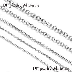 May include: Four silver chain necklaces of different lengths. DIY jewellery wholesale.