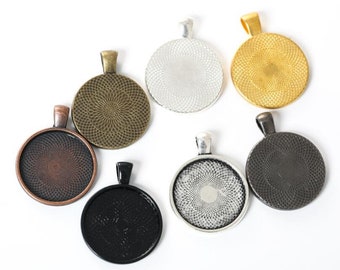 May include: Six round metal pendant trays with a decorative pattern. The trays are in various colors, including silver, gold, black, and copper.