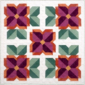 May include: A square quilt featuring five floral blocks arranged in a grid pattern. Each flower consists of deep purple and magenta petals with orange accents, surrounded by sage green leaves, all set against a white background with circular quilting.