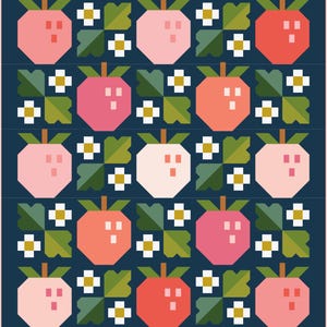 May include: A geometric pattern featuring stylized strawberries in shades of pink and red, with green leaves and white flowers, set against a dark blue background. The design is reminiscent of a quilt or fabric pattern.