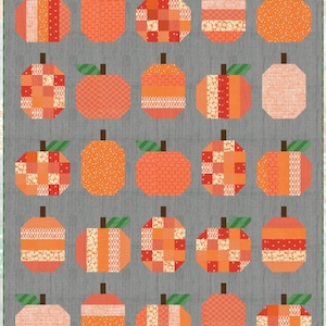 May include: A quilt featuring a repeating pattern of twenty-five stylized orange pumpkins arranged in a five-by-five grid. Each pumpkin has a dark brown stem and a single green leaf, set against a solid gray background with a subtle texture.