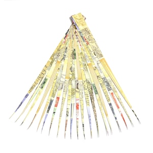 May include: A fan of yellow and cream paper strips with a map-like pattern. The strips are fanned out in a triangular shape.