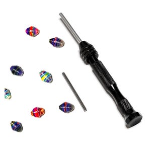 May include: A set of colorful, striped beads with a black and silver bead making tool and a silver metal rod.
