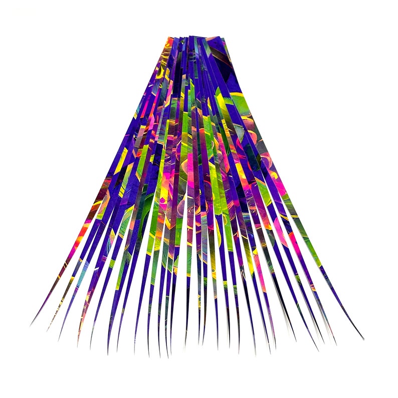 May include: A fan of colorful, thin strips of paper, arranged in a radial pattern, resembling a burst of fireworks.