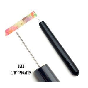 Paper Bead Roller Quilling Tool with 1/16 inch diameter Slotted Tip and black vinyl covered handle. Paper roller has strip of paper in tip.