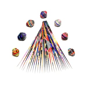 May include: A colorful paper craft in the shape of a Christmas tree with eight colorful paper balls surrounding it.