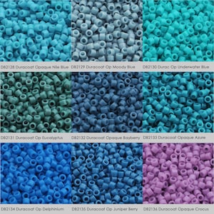 May include: A collection of 10 different colours of opaque and translucent Duracoat beads. The colours include Nile Blue, Moody Blue, Underwater Blue, Eucalyptus, Bayberry, Azure, Delphinium, Juniper Berry, and Crocus.