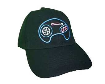 Neon Genesis Controller Hat - Black Hat with shiny metallic embroidered patch attached.