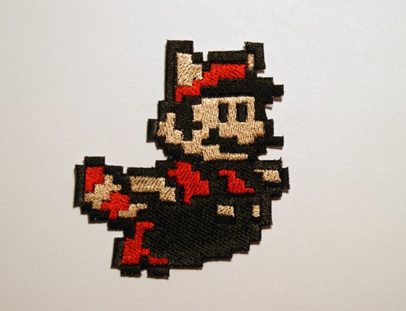 8 Bit Mario or Luigi Racoon Tail Shiny Metallic Embroidery Iron On patch.  Super Mario Bros. Pixelart.