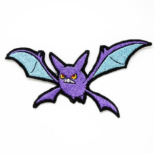 May include: Purple and blue embroidered iron-on patch of a cartoon bat with angry eyes.