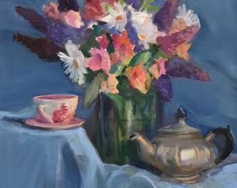 Tetera, taza y flores.