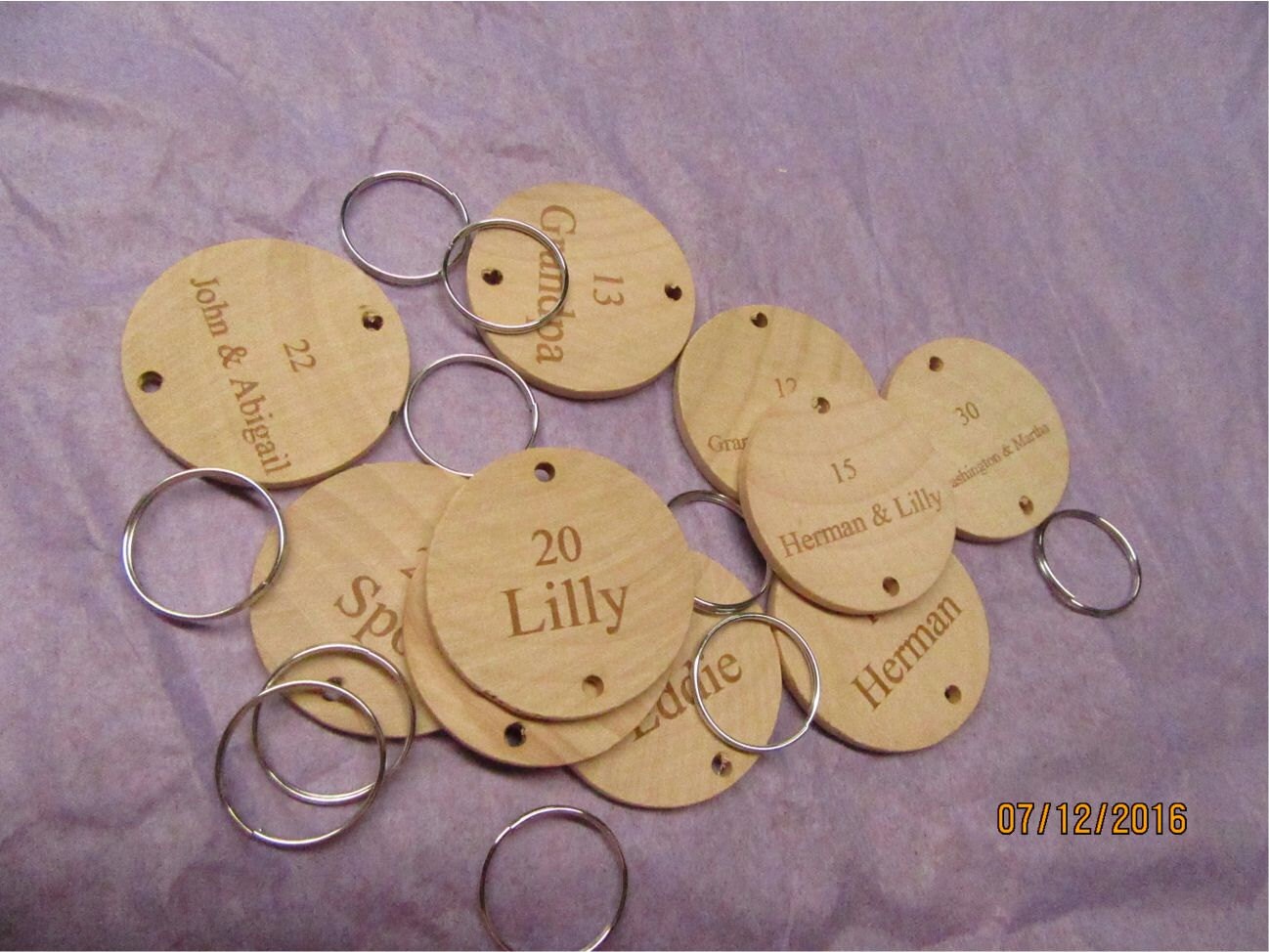 One customized and engraved tag used in  family celebration board.Int…