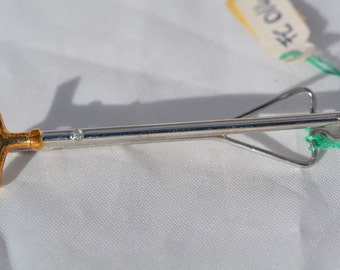 Tie clip in 18 kt shiny yellow gold, 750 marked, and Steel