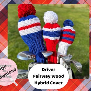 May include: Crocheted golf club covers in red, white, and blue. The covers are on golf clubs in a golf bag. The covers have a pom-pom on top and are labeled "Driver Fairway Wood Hybrid Cover."