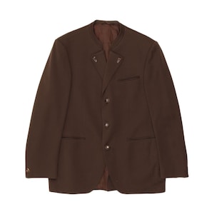 May include: A brown blazer with a mandarin collar, three buttons, and two front pockets. The blazer has a tailored fit and a classic design. The sleeves have a button detail at the cuff. The blazer is made of a solid, dark brown fabric.