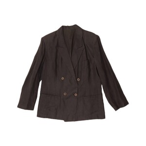 May include: A dark brown double-breasted blazer featuring a notched lapel, long sleeves, and four visible buttons arranged in two columns on the front. The garment includes two lower pockets and is constructed with a textured fabric finish.