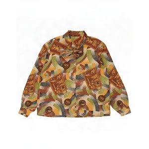 May include: A long-sleeve button-down shirt featuring a multi-coloured geometric and circular pattern in shades of orange, green, and brown. The shirt includes a pussy-bow collar detail and rectangular panels with intricate illustrations throughout.
