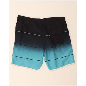 Bañador corto Fila para hombre con estampado gráfico, color azul medio, poliéster. imagen 2