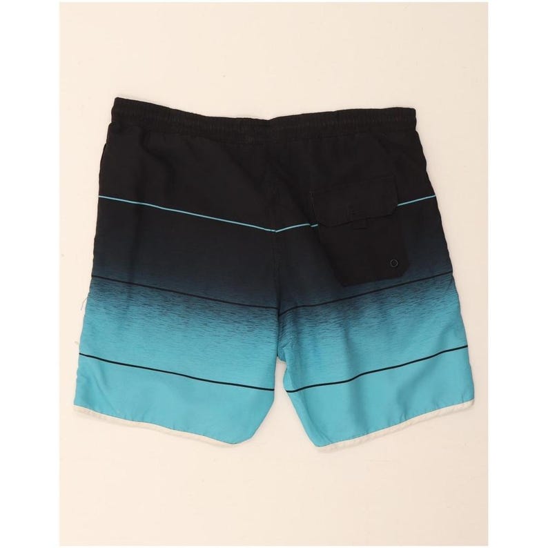 Bañador corto Fila para hombre con estampado gráfico, color azul medio, poliéster. imagen 2