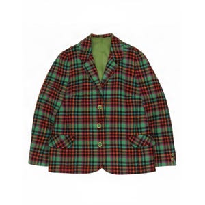 May include: A blazer featuring a vibrant plaid pattern in shades of green, red, and black. The garment includes a notched lapel, three front buttons, two flap pockets at the waist, and long sleeves with buttoned cuffs, all lined in solid green.