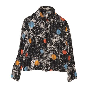 May include: A long-sleeved button-down shirt in black featuring a white abstract splatter pattern and scattered solid orange and blue circles. The garment has a standard collar, a front button closure, and a straight hemline with long sleeves.