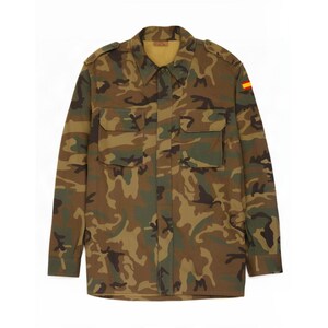 May include: A long-sleeve button-up shirt featuring a camouflage pattern in shades of brown, green, and black. The shirt includes two chest pockets with flaps, shoulder epaulets, and a small Spanish flag patch on the upper left sleeve.
