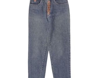 Jeans vintage de mujer de talle alto y corte ajustado, talla 46 (W26 L28), color azul con estampado floral.