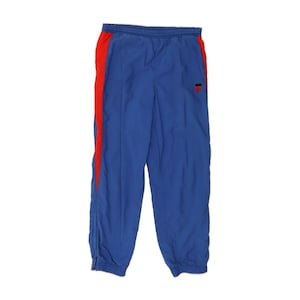 Pantalones de chándal Fila para hombre, estilo joggers IT 46, color azul pequeño con bloques de color imagen 1