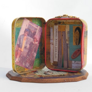 It&#39;s Not your Shoes: Assemblage piece made with metal tin, photos and vintage found objects.