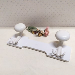Wall coat rack, plastic white coat rack, space age