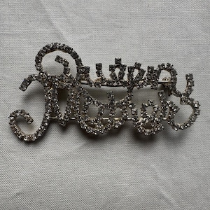 Vintage Queen Mother Rhinestone Brooch - Ice Colored Rhinestones Cursive Script