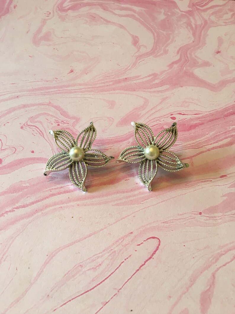 Sarah Coventry Clip on Flower Earrings Silver Toned Metal Pearlescent Bead Filigree 1960s Floral Petal Filigree Design Five Petal