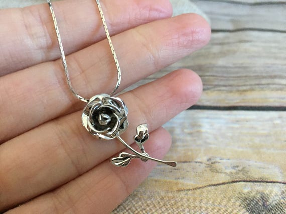 Silver Toned Metal Rose Pendant With 