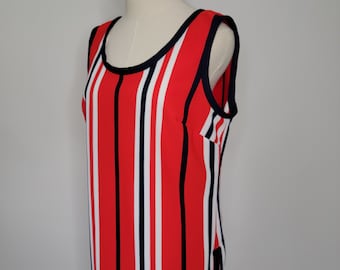 May include: A red, white, and navy blue striped sleeveless top with a scoop neck. The top has a black trim around the neckline and armholes.