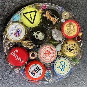 Coaster, Beer Bottlecaps, handmade with microbrew and other various upcycled/recycled bottlecaps. Epoxy Resin, round coaster beveled edges