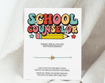May include: A blue and gold star charm bracelet with a card that says "School Counselor" in colorful retro font. The card also says "Thanks for all you do! #DifferenceMaker" and includes instructions for making a wish on the bracelet.