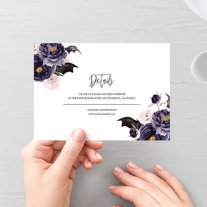 May include: A white card with black bats and purple and pink flowers. The text on the card reads "Details", "A block of rooms have been reserved at the Four Seasons Hotel San Francisco, California", and "For more information www.sarahanddavid.com".