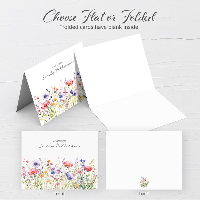 May include: A note card with a watercolor floral design featuring pink, purple, and yellow flowers. The front of the card has the text "A note from Emily Patterson". The back of the card is blank.