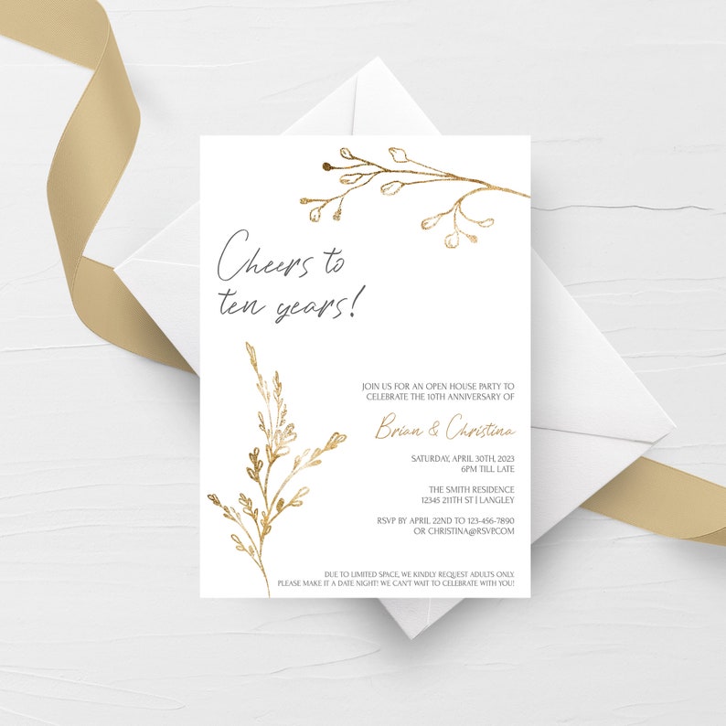 May include: A white invitation card with gold lettering and floral illustrations. The text reads "Cheers to ten years!" and includes details for an open house party to celebrate the 10th anniversary of Brian & Christina. The party is scheduled for Saturday, April 30th, 2023, from 6 PM till late at The Smith Residence, 12345 211th St, Langley. RSVP by April 22nd to 123-456-7890 or ChristinaG@RSVP.com.