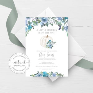 May include: A baby shower invitation featuring a white pumpkin and blue flowers. The text reads "A little pumpkin is on the way!" and includes the name "Amy Jones".