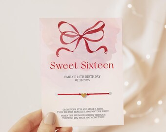 May include: Red and white watercolor card with a red bow and the text "Sweet Sixteen" and "Emily's 16th Birthday 02.18.2025". A red string bracelet with a gold heart charm is attached to the card. The card includes the text "Close your eyes and make a wish, then tie this bracelet around your wrist. When the string has worn through the wish you made may come true!"