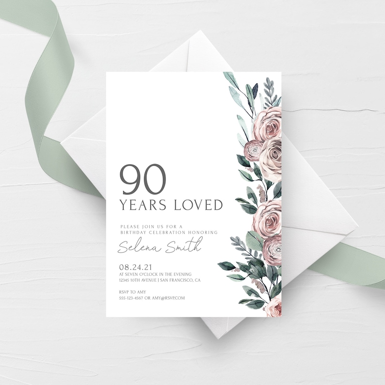 May include: A white invitation card featuring a floral design in shades of pink and green. The text on the card reads "90 Years Loved" and includes details for a birthday celebration in honour of Selena Smith. The date of the event is 08.24.21, and the time is 7:00 PM. The location is 12345 10th Avenue, San Francisco, CA. The RSVP information is provided, including the contact number 555-123-4567 and email address AMY@RSVPCOM.