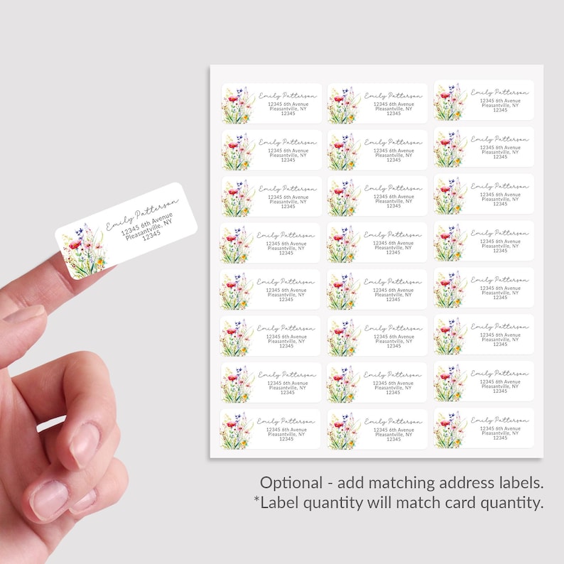 May include: A sheet of 24 address labels with a watercolor floral design. The labels feature the text "Emily Patterson" and an address. The text "Optional - add matching address labels." and "*Label quantity will match card quantity." are printed at the bottom of the sheet.