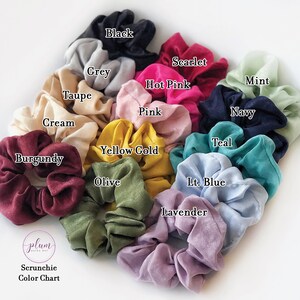 a bunch of scrunchy hair scrunches on a white surface