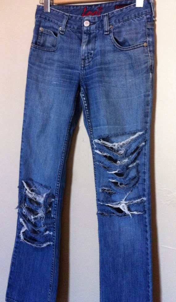 ripped 90s jeans